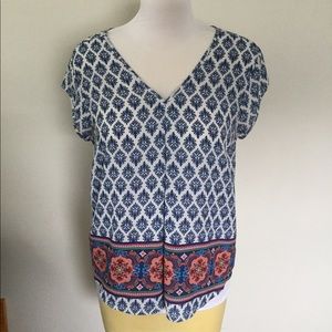 Flowy cap sleeve shirt